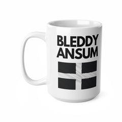 White ceramic mug with bold text “Bleddy Ansum” and the black and white Cornish flag (St Piran’s Flag) – a funny Cornwall-themed coffee mug.