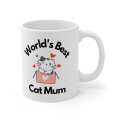 White ceramic mug with the phrase “World’s Best Cat Mum” and a cartoon cat in a pink box with hearts – a cute gift for cat lovers or pet mums.