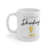 White ceramic mug featuring the text “I'd Rather Be Drinking Than Working” with a watercolour-style wine glass illustration – funny wine lover office gift.