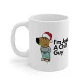 White ceramic mug with a cartoon dog in a Santa hat and the phrase “I’m Just a Chill Guy” – a funny Christmas-themed coffee mug for relaxed holiday vibes.