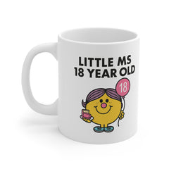 White ceramic mug featuring a cartoon girl with a pink “18” balloon and the text “Little Ms 18 Year Old” – a funny and cute birthday mug for girls.