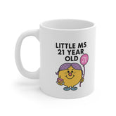 White ceramic mug with a cartoon character holding a 21 balloon and cake, titled “Little Ms 21 Year Old” – a fun birthday gift for her.