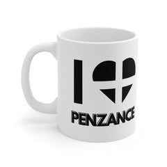 White ceramic mug with the text “I ❤️ Penzance” and a heart in the Cornish flag design – a great souvenir or gift for lovers of Penzance and Cornwall.