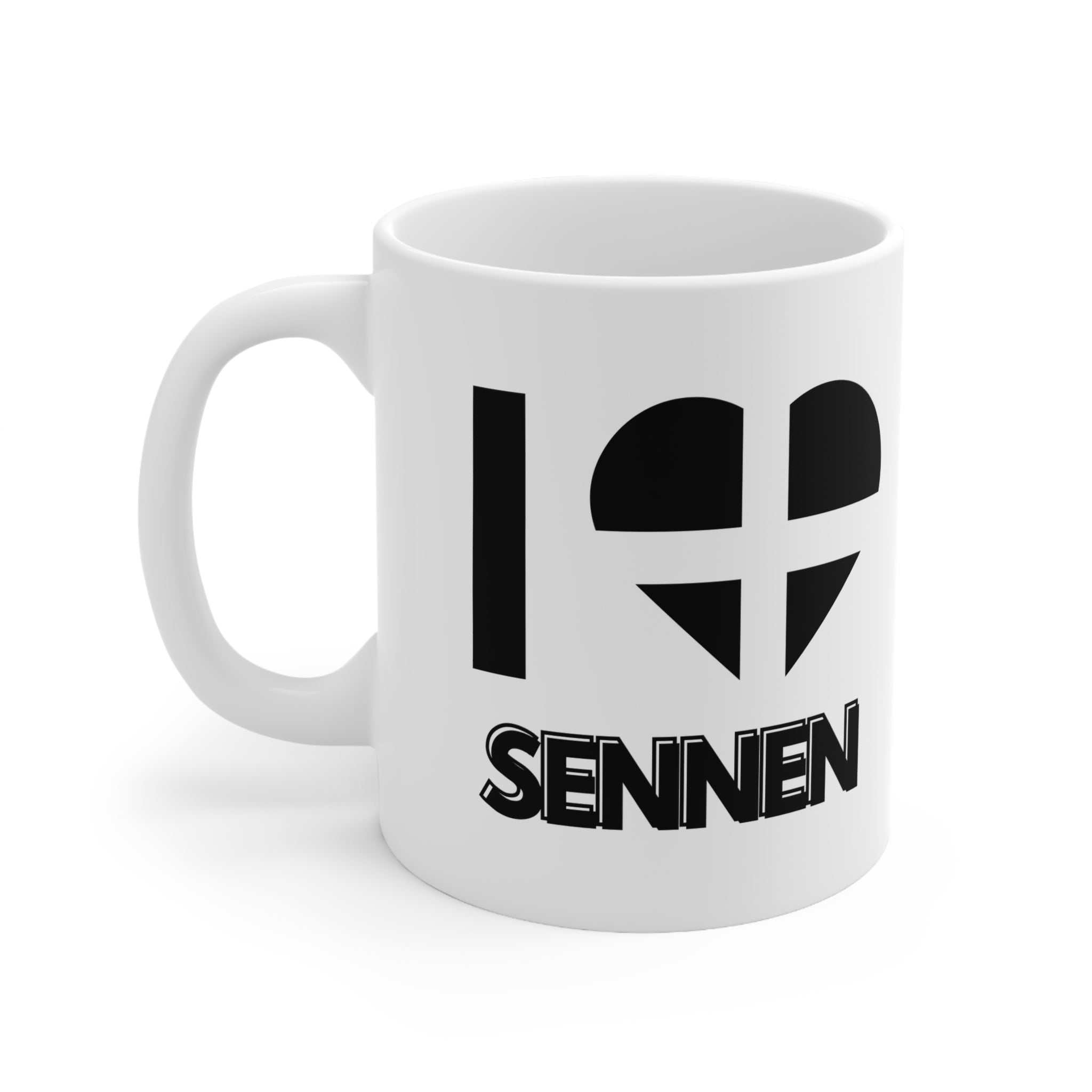White ceramic mug with the text “I ❤️ Sennen” and a heart in the Cornish flag design – the perfect gift or souvenir for lovers of Sennen and the Cornwall coast.