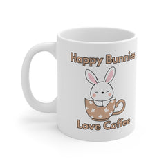 White ceramic mug with a cute bunny sitting in a floral teacup and the text “Happy Bunnies Love Coffee” – a sweet gift for bunny lovers and coffee fans.