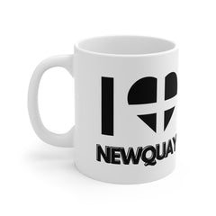 White ceramic mug with the text “I ❤️ Newquay” and a heart styled in the Cornish flag – a perfect Cornwall gift for Newquay lovers and surf fans.

